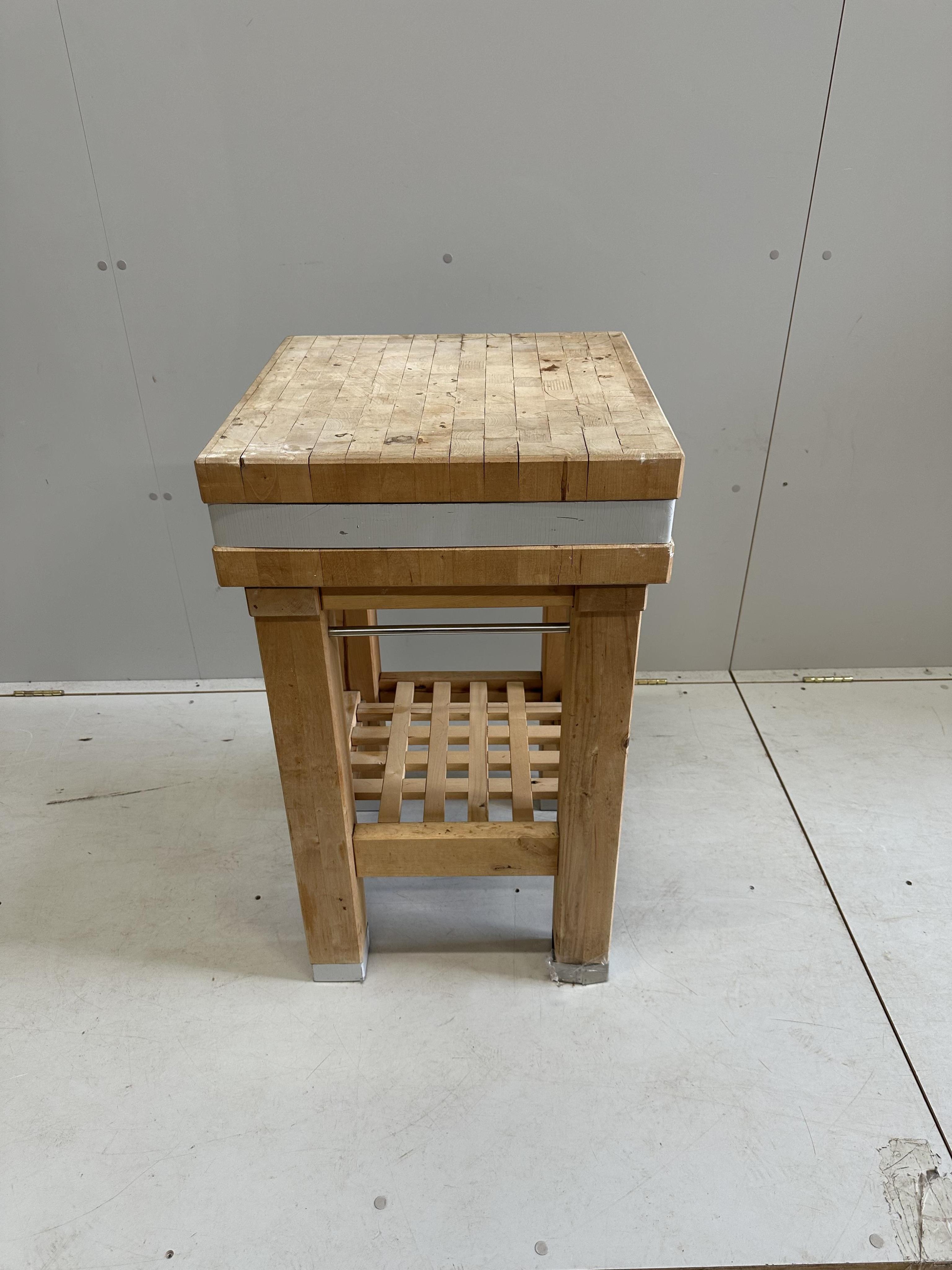 A modern beech two tier butcher's block, width 49cm, depth 49cm, height 84cm. Condition - fair